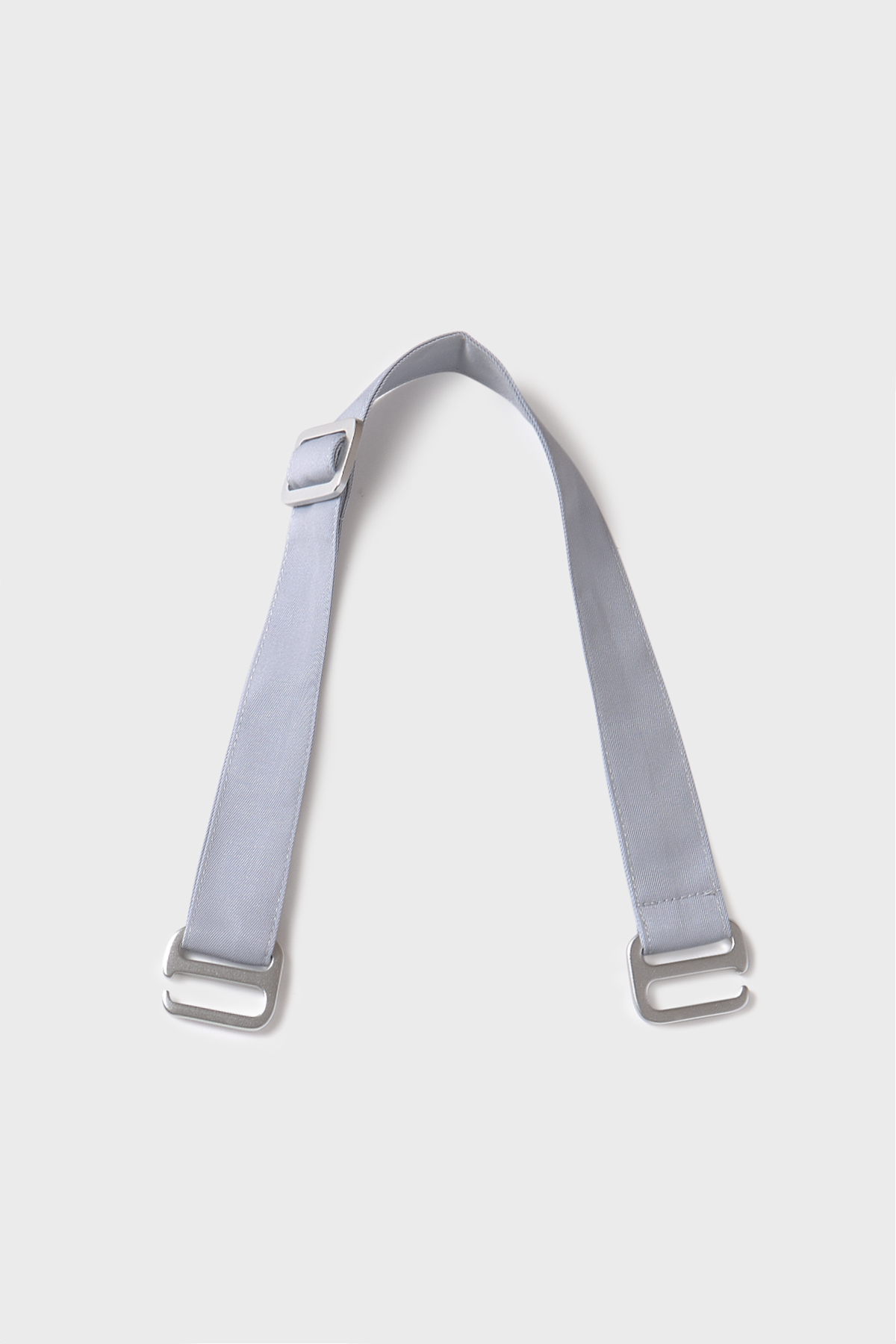 https://bastidaforwork.com/wp-content/uploads/2022/06/Bastidaforwork_workwear_uniforme_sustainable_strap_2_ways_grey_1.jpg